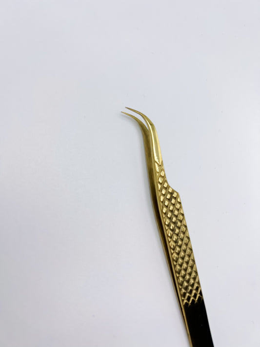 Strong Curve “Omega” Tweezer