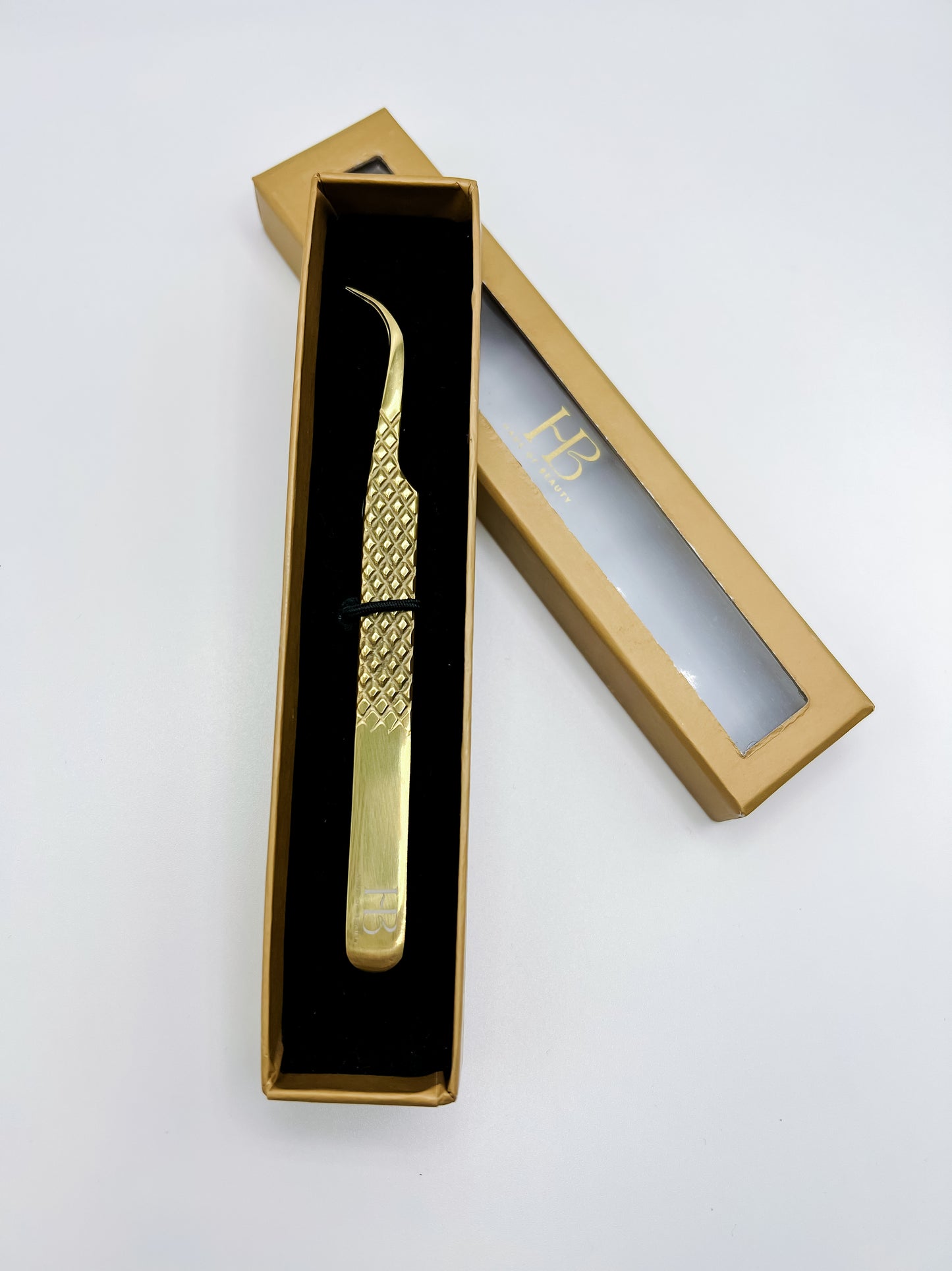 Strong Curve “Omega” Tweezer